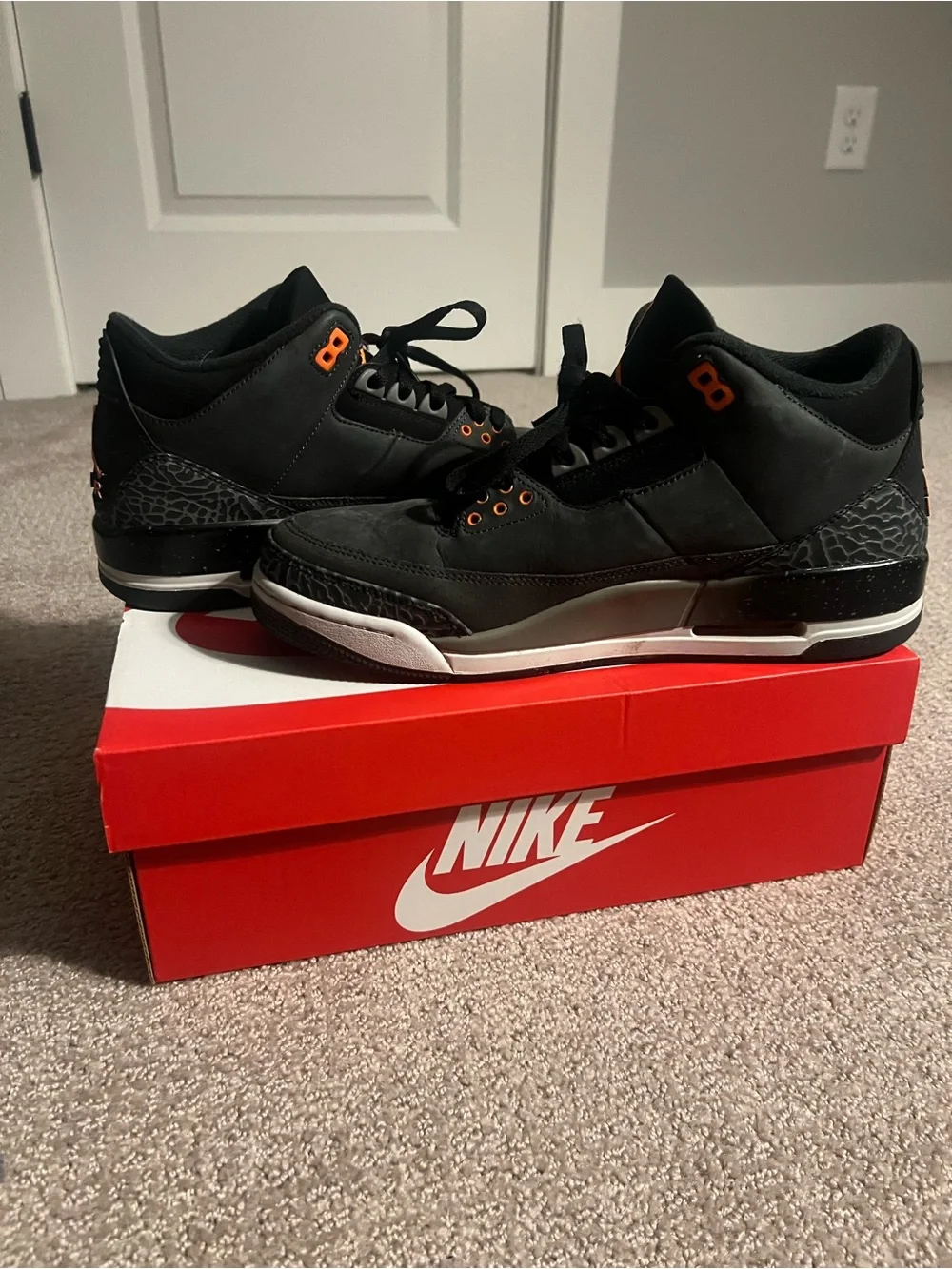 Jordan Men’s Sneaker in Black with Orange Jumpman